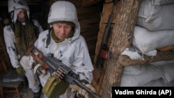 At The Front Lines, Ukrainian Soldiers And Civilians Endure Cold, Wait For A Possible War With Russia