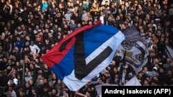 Partizan supporters wave a Serbian flag with the letter Z -- a symbol of support for Russian military action in Ukraine -- during a match in Belgrade in April.