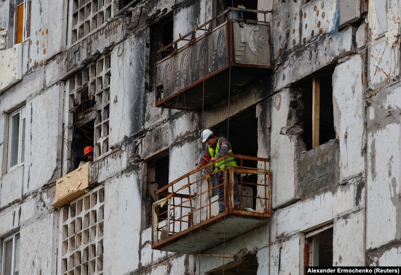 Construction workers in a war-damaged apartment building. Images of the devastated city became emblematic of Russia&#39;s ruinous invasion of Ukraine, but in recent months only occasional photos have been released by Russia&#39;s state-run news agencies.&nbsp;