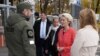 Estonian Prime Minister Kaja Kallas (right) and European Commission President Ursula von der Leyen (second right) visit Narva, Estonia's third-largest city, situated on the west bank of the Narva River by the Russian border, on October 10, 2022. 