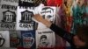 ARMENIA -- A shop owner displays a T-shirt depicting the opposition lawmaker, Nikol Pashinian, in Yerevan, May 4, 2018