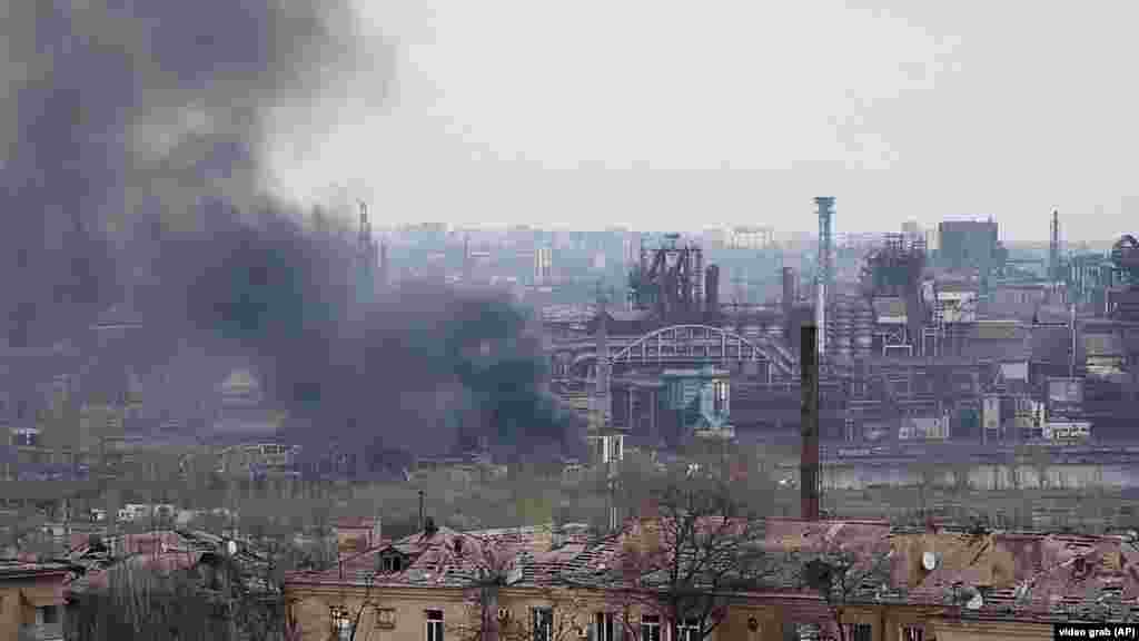 Smoke rises from the Azovstal steelworks in Mariupol on May 3. The International Committee of the Red Cross confirmed that several dozen civilians left the plant in a safe-passage operation.