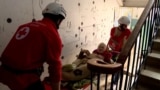 GRAB - Under Shellfire, A Red Cross Team Tries To Evacuate A Ukrainian Village