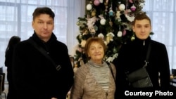 Татьяна Савинкина ўз оиласи аъзолари билан
