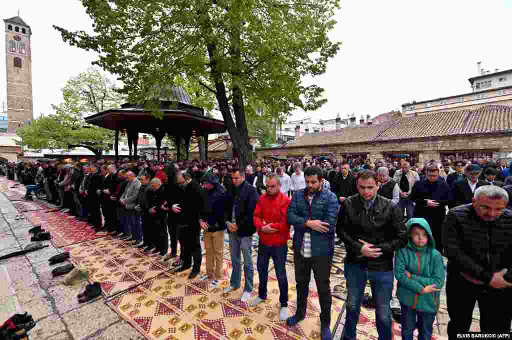 Bosnian Muslims take part in Eid al-Fitr prayers in front of the 16th-century Gazi Husrev-beg mosque in Sarajevo on May 2.&nbsp;