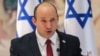 Kryeministri izraelit, Naftali Bennett, kryeson takimin javor të kabinetit në Jeruzalem të hënën, 19 korrik 2021. 