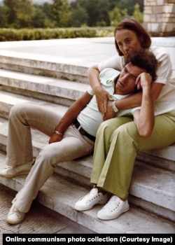 Elena cuddles with her son, Nicu, the heir apparent to Nicolae Ceausescu.