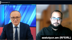 Политолог Илья Куса (справа) дает интервью ведущему «Воскресной аналитической программы» Азатутюн ТВ Грайру Тамразяну