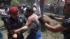 Armenia - Police arrest an opposition supporter during a protest outside a government building in Yerevan, May 30, 2022