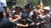 Armenia - Police clash with opposition protesters outside a government buiolding in Yerevan, May 30, 2022.