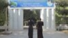 turkmenistan. would-be students in front of hospital waitting to obtain health certificate