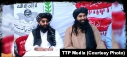 TTP chief Noor Wali Mehsud (left) appears with another movement leader in an undisclosed location. (file photo)