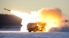 A U.S. Army M142 High Mobility Artillery Rocket Systems (HIMARS) launches ordnance