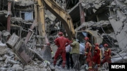 Thirty-seven people were injured when the 10-story residential and commercial building collapsed on May 23.