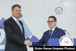 Eduard Hellvig, șeful SRI, alături de președintele României, Klaus Iohannis.