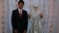 Newly married Anvar and Nargiz after their traditional wedding. The Tajik government is wary of a revival of Muslim customs, fearing the rise of radical Islam and the return of young people who went to fight in Syria.