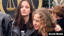 Pussy Riot activist Lyusya Shtein (left) with her partner Maria Alyokhina (file photo)