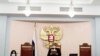 قاصی دیوان عالی روسیه در حال قرائت حکم انحلال گروه مدافع حقوق بشر مموریال 