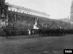 Red Army troops parade past the Kremlin on Red Square on November 7, 1922, to mark the fifth anniversary of the Bolshevik seizure of power.