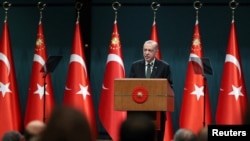 Turkish President Tayyip Erdogan addresses the media after a cabinet meeting in Ankara, Turkey, December 20, 2021.
