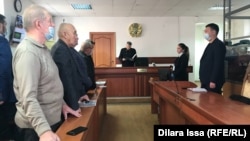 Judge Absattar Shakhidinov on December 21 sentenced 13 people to prison terms between 15 months and 14 years.
