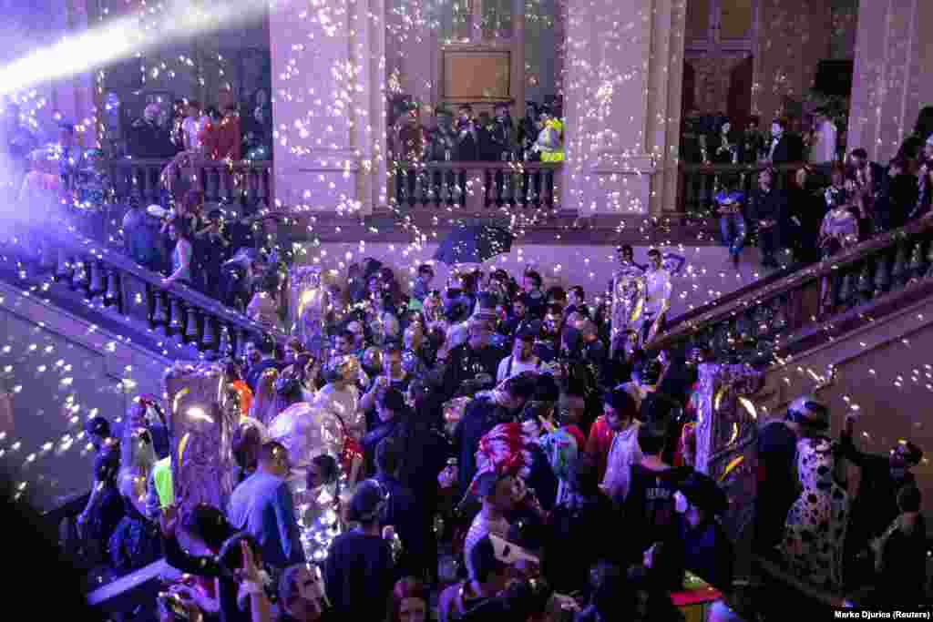Students and revelers take part in the annual pre-New Year&#39;s masquerade themed &quot;Escape From Reality&quot; at the Faculty of Technical Science in Belgrade, Serbia, on December 26.