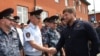 Чеченские полицейские и глава республики Рамзан Кадыров, иллюстративное фото