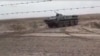 A video grab shows a military vehicle stationed on the Turkmen side of the Turkmen-Afghan border in December 2021.