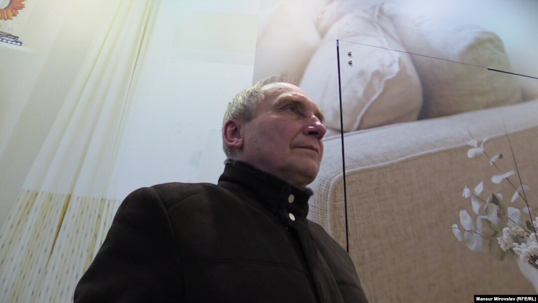 „Nu există nicio isterie, asta este sigur”, spune Igor Kozlovski, profesor universitar din Donețk, care spune că a fost torturat în închisorile separatiste.