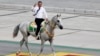 Turkmenistan Parade -- Turkmenistan's President Gurbanguly Berdymukhammedov attending a parade in September 2021