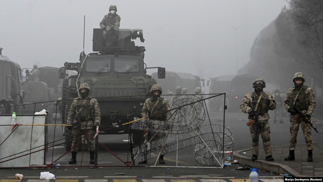 Troops are seen in Almaty's main square where hundreds of people were protesting against the government after the Kazakh authorities' decision to lift price caps on liquefied petroleum gas.