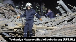 Rescuers search the rubble for survivors after a Russian attack on Zaporizhzhya, Ukraine, on November 7. 