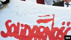 The logo of the "Solidarity" union that led the fight against the Communist Party in Poland.