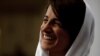 Iranian lawyer and rights defender Nasrin Sotoudeh smiles at her home in Tehran, September 18, 2013