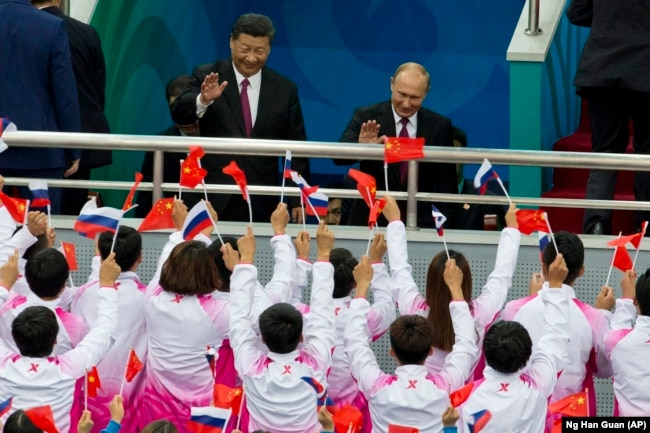 Си Цзиньпин и Владимир Путин в Китае