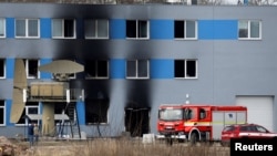 The aftermath of a fire at an industrial compound in Pardubice, Czech Republic, that authorities are investigating as terrorism.