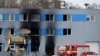 Aftermath of a fire at an industrial compound in Pardubice, Czech Republic, that authorities are investigating as terrorism