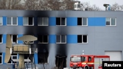 Aftermath of a fire at an industrial compound in Pardubice, Czech Republic, that authorities are investigating as terrorism