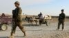 FILE: Afghan soldiers at a checkpoint in Jawzjan