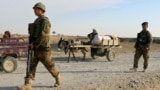 Afghan National Army (ANA) troops keep watch at a checkpoint in Aqcha district of Jawzjan province in northern Afghanistan on November 27.