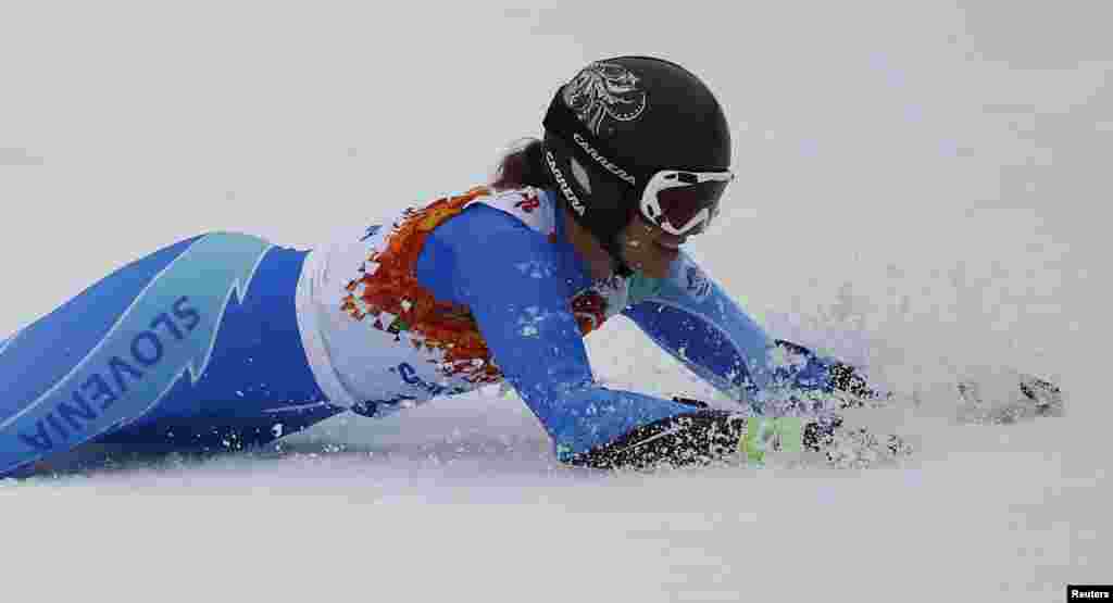 Slovenia&#39;s Tina Maze reacts area after winning the women&#39;s alpine-skiing giant slalom event. (Reuters/Kai Pfaffenbach)