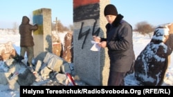 The monument honors victims of a 1944 massacre by a Nazi unit composed mostly of Ukrainian volunteers.