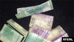 Many Tajiks can't distinguish counterfeit currency from real currency