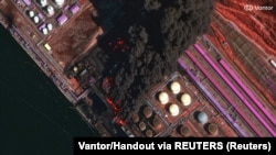 Пожежа в порту Усть-Луга на Балтиці в Ленінградській області Росії після українського удару дронами, 27 березня 2026 року