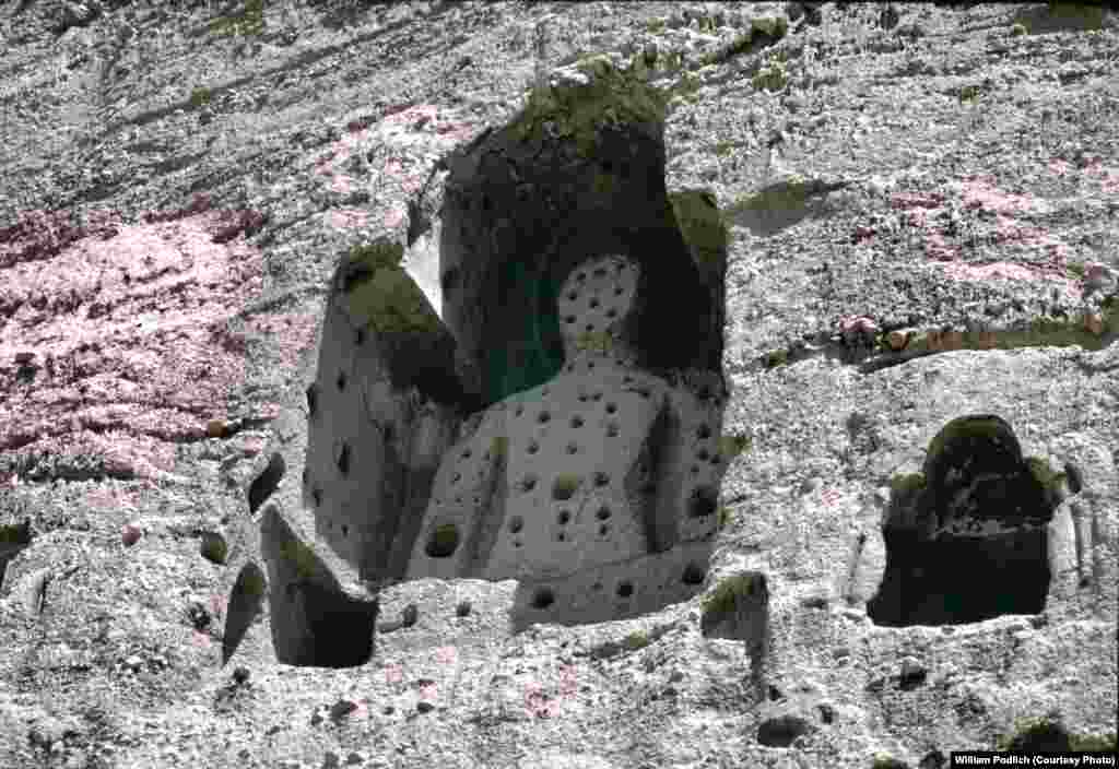 A smaller Buddha statue in the Bamiyan Valley