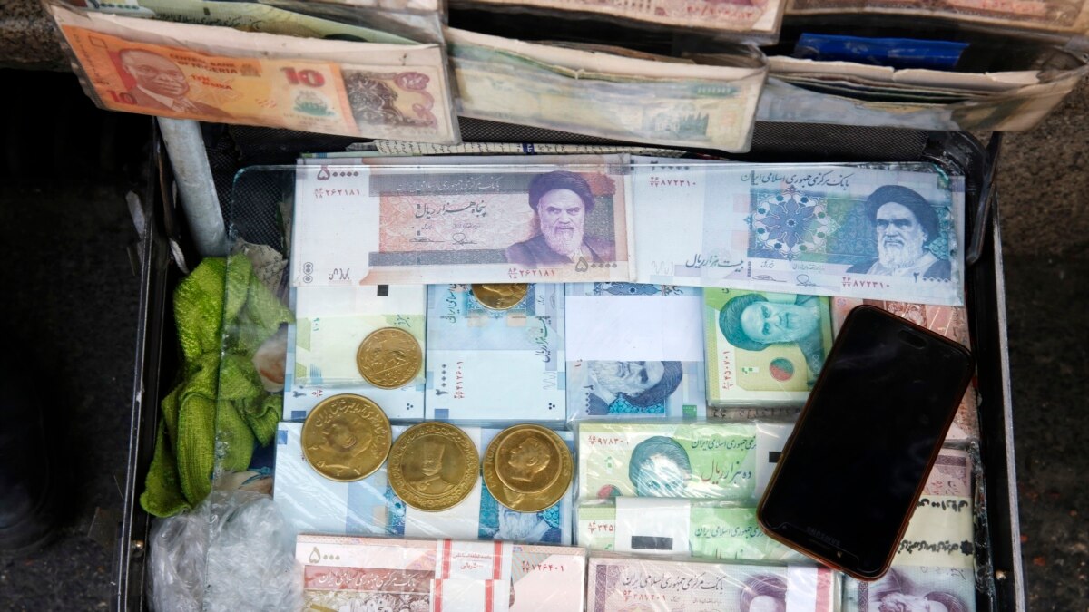 iran currency compare to euro and us dollar