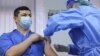A man receives a dose of the AstraZeneca vaccine against COVID-19 at a hospital in Chisinau earlier this month. 