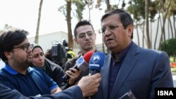 Abdolnaser Hemmati , Governor of the Central Bank of Iran speaking to reporters. FILE PHOTO.