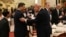 Chinese leader Xi Jinping and US President Donald Trump shake hands as they attend a state banquet at the Great Hall of the People in Beijing on May 14.