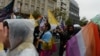 Pride supporters march in the streets of Belgrade on September 17.